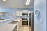 Fully equipped kitchen with new stainless appliances 